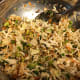 Cabbage, green onions, edamame, toasted ramen, toasted almonds, and dressing