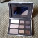 Inside the eyeshadow palette, you get three larger highlight shades (although Nudie is better as a transition shade on fairer skin tones) and six smaller ones. The palette also features a small mirror.