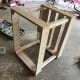 Slide the other 1x4 frame over the top of the 2x2 posts and screw it into place.