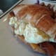 The sandwich includes your meat choice, egg, cheese and tomato