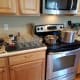 Set out your pressure canning station. You'll need your pressure canner and a large pot of water to boil, clean pint canning jars with lids and rings, a large ladle, a canning kit of tools needed for canning, salt, measuring spoons, and a towel.