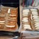 Line two cookie sheets with parchment paper and line the parchment paper with sliced potatoes.