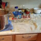 Since I cooked my salsa in my water bath canner, I have to set up a quick canning station next to my canner.