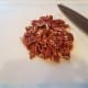 Now chop up your pecans for the topping.
