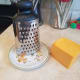 Grate your cheese.