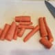 Chop several carrots.