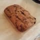 Use the parchment paper to lift your loaves out of the pans and slice.