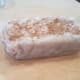 Pull it out of the pan with the parchment paper.