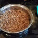 In the meantime, cook your hamburger meat in a pan on the stove.