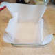 Step Six: Line your desired brownie baking dish with parchment paper. You'll see why in a little bit.