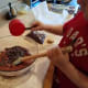 Step Seven: Fold in the chocolate chips, leaving a handful for topping the brownies.