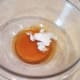 Melt your honey and coconut oil together in a large bowl.
