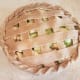I finished the pie by rolling the two crusts together around the outside. You could do the same with a solid top crust, but make sure to cut vents into the top if you choose not to basket weave. Sprinkle some sugar over the top and bake for 45 min.