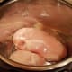 Place your thawed chicken breasts into the bottom of your pot.