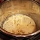 Add your half and half and flour to the pot and whisk.