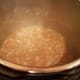 Add in your veggie broth and scrape the bottom of the pot to get any cooked on bits.