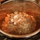 And add those to the pot with your spices.