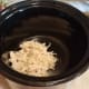 I tossed my pre-cooked shredded chicken into the crock-pot. (I like to cook my chicken ahead of time in bulk in the crock-pot. Then I can shred it all, bag it up in single breast servings, and keep it in the freezer for when I need a quick meal.)