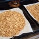 And spread your granola out evenly to bake.