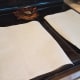 Line two cookie sheets with parchment paper.