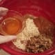 Finish off with your vanilla extract and mix everything together. Save your raisins and dried apples until after you bake your granola.