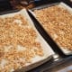 Pour the granola out in a thin, even layer on your cookie sheets.