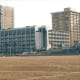 A view of a beachside hotel from the beech.