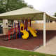 The Legacy also offers a shaded playground for the kids with a soft rubberized mulch like turf.