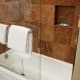 The shower had beautiful tile on the walls, but the tub and shower head could definitely use some updating. It was still very clean though!