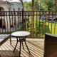 The back porch area with a great view of the well manicured grounds.