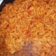 Turn off the stove and remove the pan. Open the lid and fluff the rice with a spoon or fork.