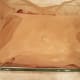 Once thick enough for your liking, pour your caramel over the cheesecake and spread evenly. Pop the whole thing in the freezer now for a couple hours to completely harden.
