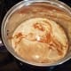 Once dissolved, lower the heat to simmer and mix in your cream and vanilla.