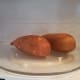 Begin by cooking your sweet potatoes. I chose to cook mine in the microwave for speed, poking fork holes in each of them first for venting.