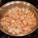 And then add them into the pan to cook.