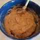 Honestly it doesn't matter what order you mix everything in, or when you stir it. You can even mix after each ingredient if you wish. Just get it all in there.