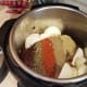 Chop and add your onion in huge pieces on either side of the roast.