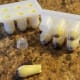 Cooled suppositories can be stored in their trays in the refrigerator.