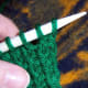 Transfer stitches back to the first needle.