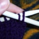 Insert left needle under the first stitch on the working needle.