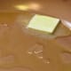 Melt the butter and heat together with the extra virgin olive oil