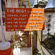 Sage advice posted on a board display at the Orange Show.