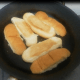 Cut your bread through the middle and toast it.
