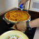 Let the baked pizza rest for 3 - 5 minutes before cutting with a pizza cutter.