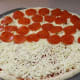 Half cheese, half Pepperoni pizza