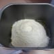 Pour the salt, sugar and yeast on top of the flour in a small pocket.