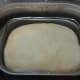 After the cycle is complete and the dough has risen.