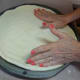 Form a small edge of rolled dough for the outer edges of the crust.