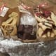 Putting foil and plastic wrap underneath the cookies helps prevent them from breaking. Adjust the amount of foil and plastic wrap depending on the number of cookies you make.