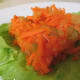 Slice of the jello mold with more than the usual amount of carrots and celery in it.